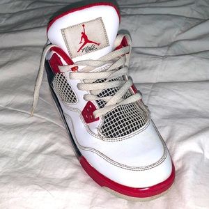Jordan 4’s authentic 2012 Retro Fire Reds. Boys size 5Y - Women size 6.5 (US).